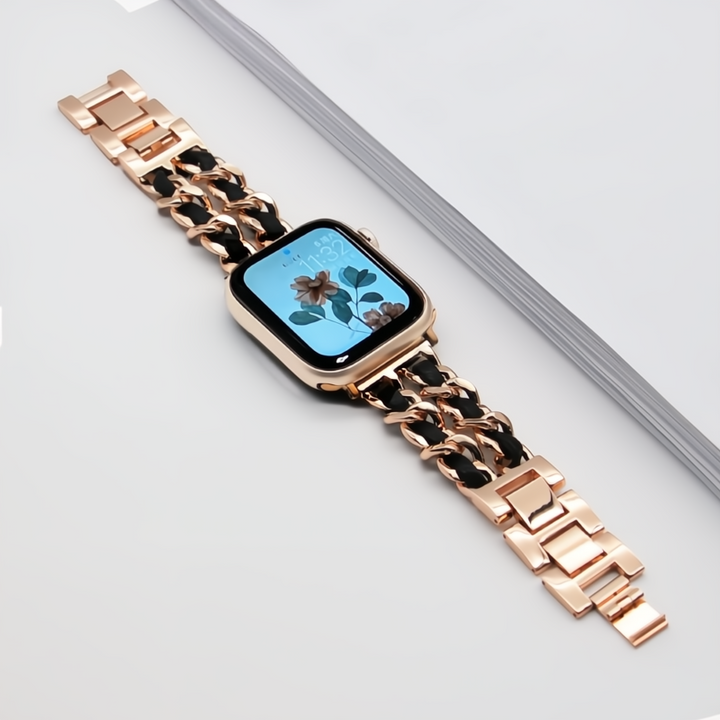 Smartwatch with a rose gold chain strap on a light gray background