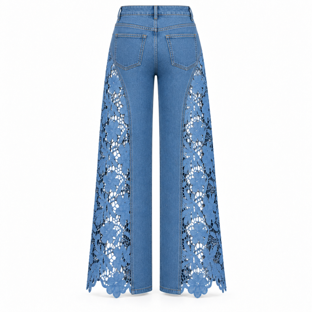 Blue wide-leg denim pants with intricate floral lace panels down the front of the legs, shown from the back on a white background.