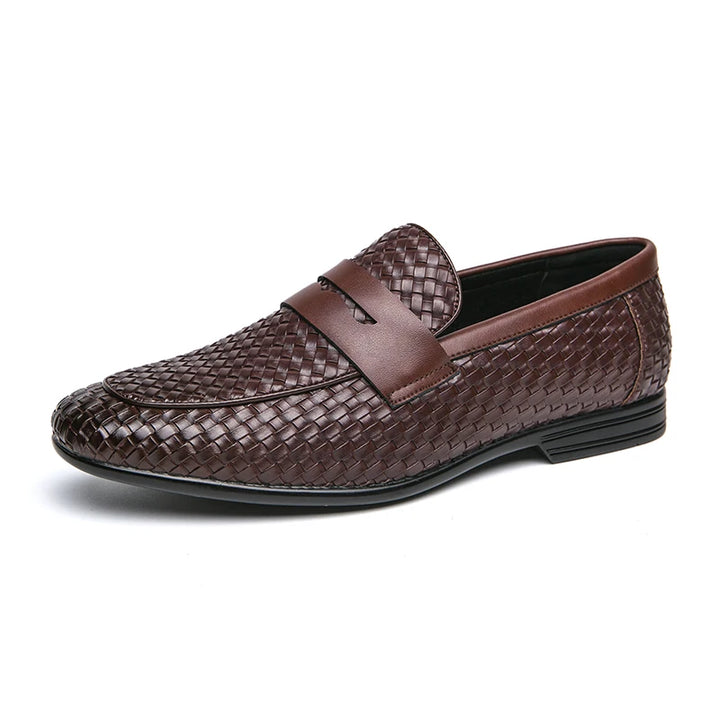 Brown woven loafer shoe on a white background