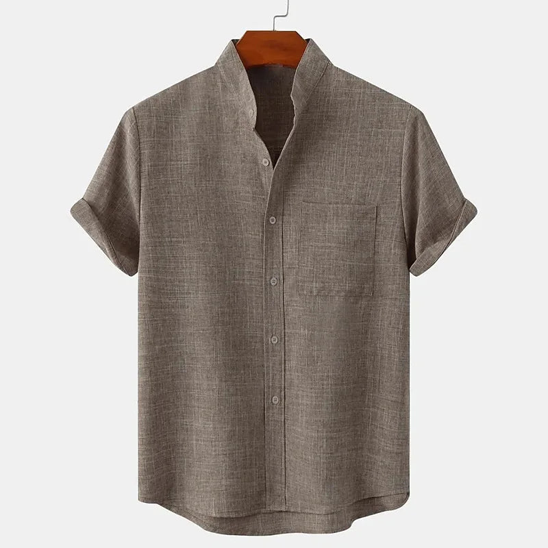 Brown short-sleeve shirt on a hanger with a white background