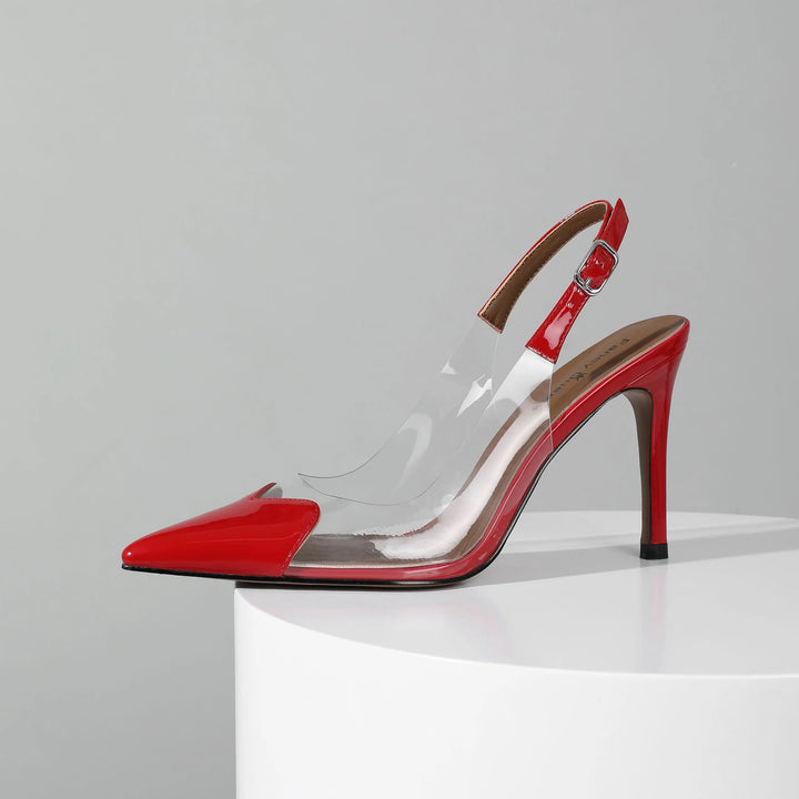 Red high-heeled shoe with clear transparent sole on a gray background