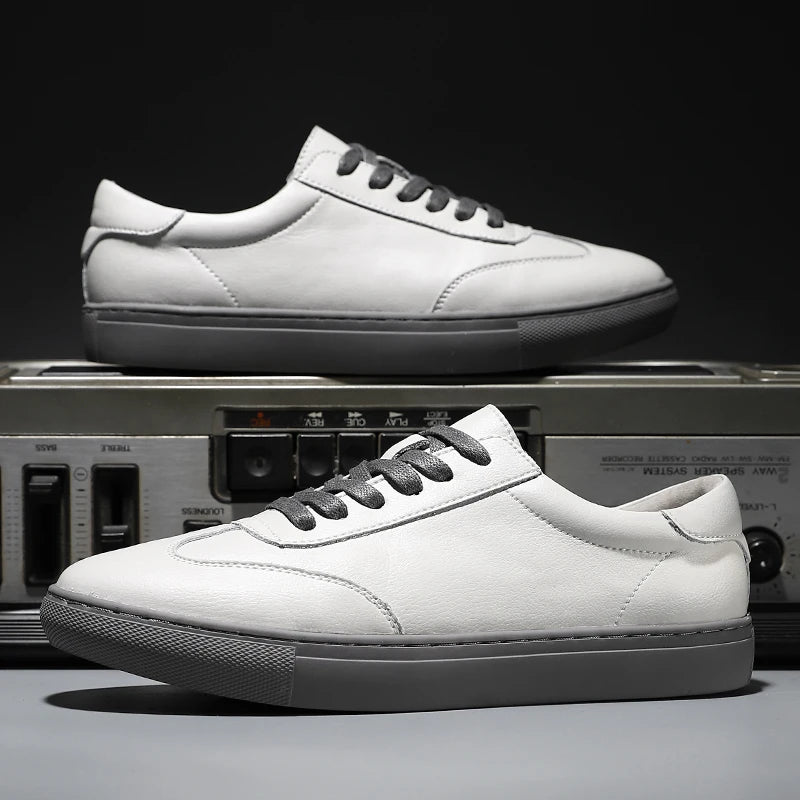 White sneakers with gray accents on a vintage radio background