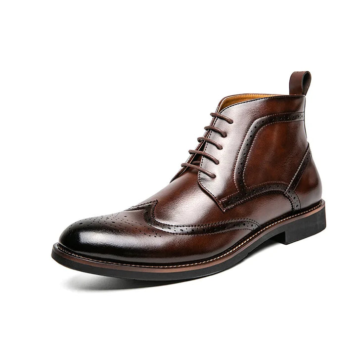 Brown leather brogue shoe on a white background