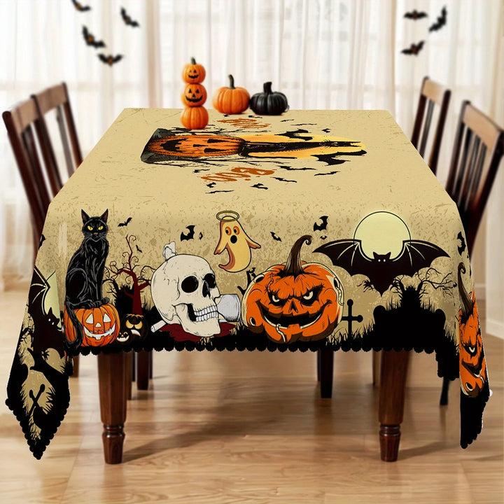 Halloween-themed tablecloth with pumpkins, ghosts, and bats on a wooden table.