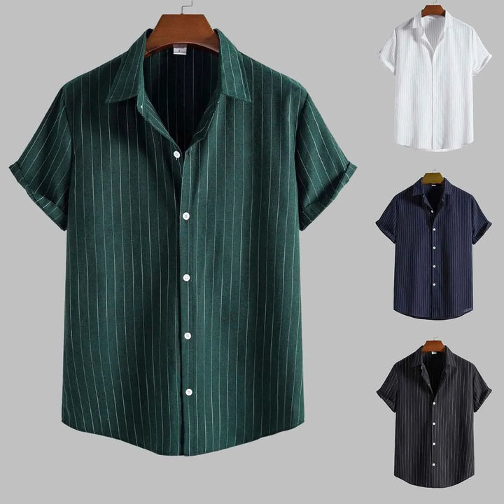 Green striped shirt on a gray background with other shirts displayed above it.