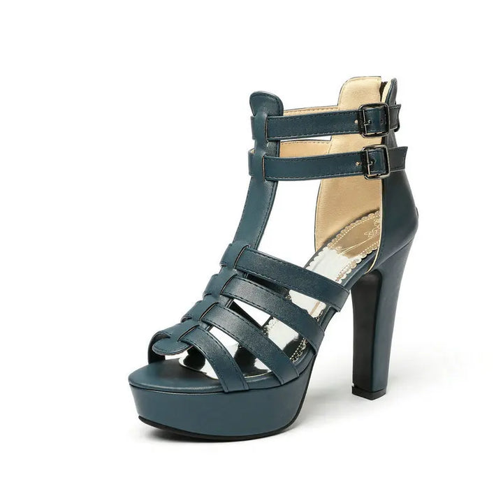 Blue high-heeled sandal with platform on a white background