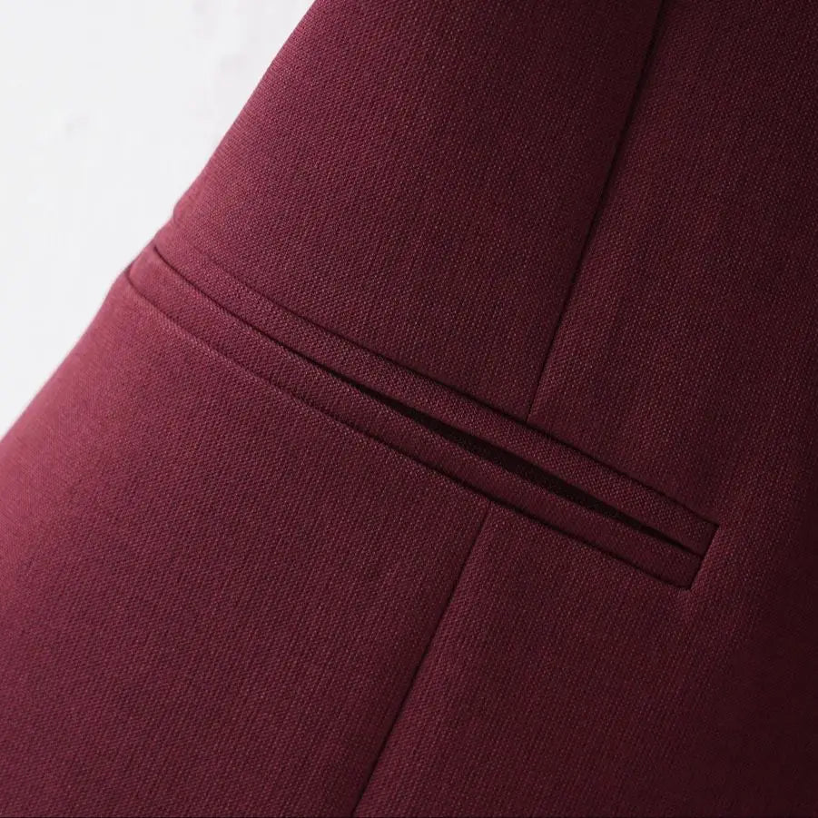 Close-up of a burgundy fabric with a white background