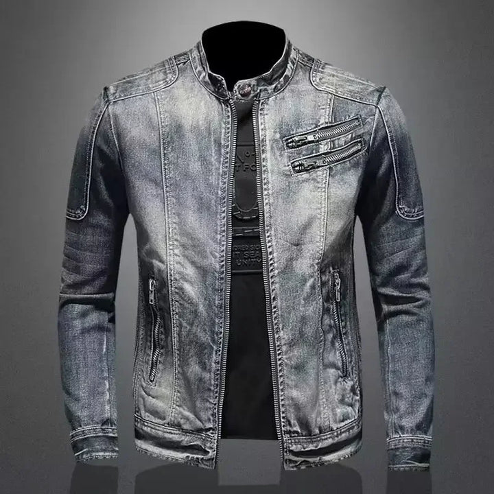 Denim jacket with zippers on a gray background