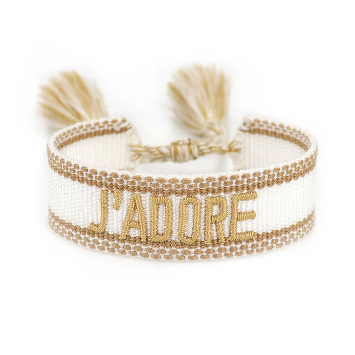 Bracelet with 'J'adore' text on a white background