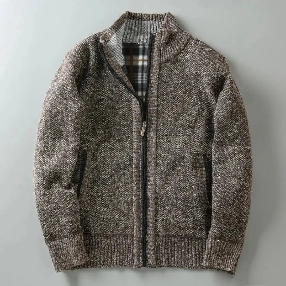 Knitted hoodie with a zipper on a light gray background
