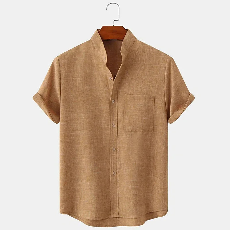 Beige short-sleeve shirt on a hanger against a white background