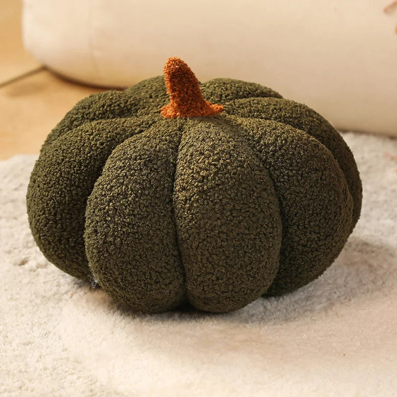Green textured pumpkin on a light surface