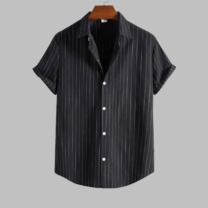 Black and white striped shirt on a gray background