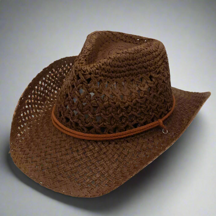 Brown woven straw hat with a band on a white background