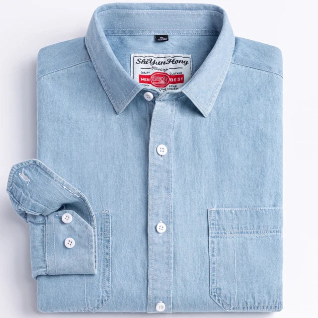Light blue denim shirt with brand label on a white background