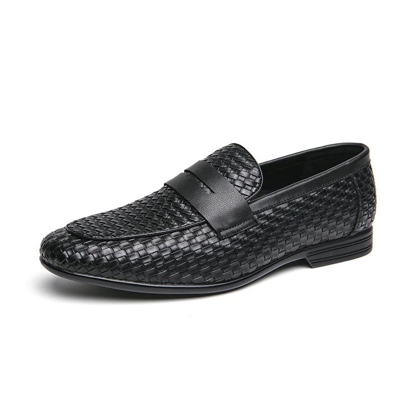 Black woven loafer shoe on a white background