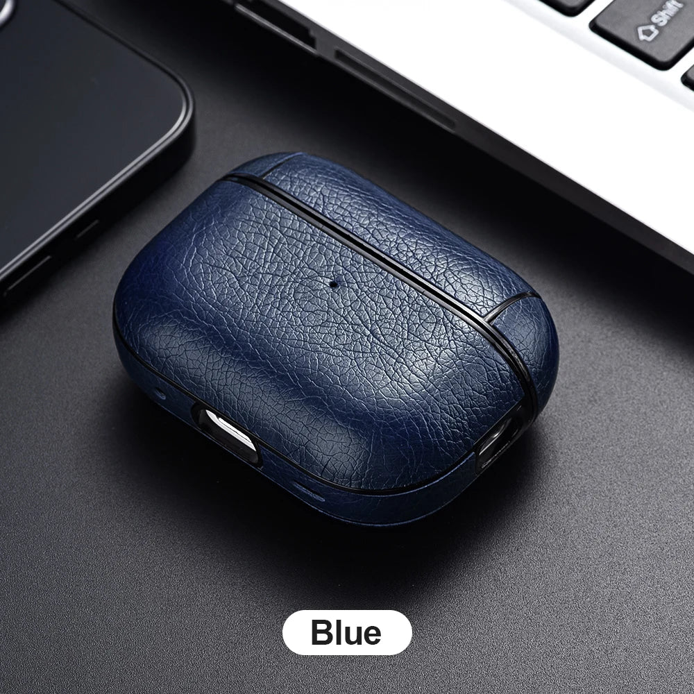 Blue wireless earbuds case on a dark surface with a blurred background