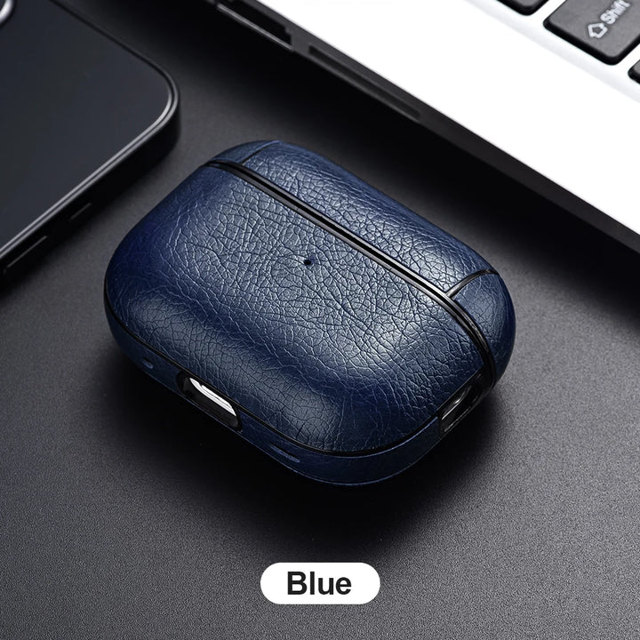 Blue wireless earbuds case on a dark surface with a blurred background