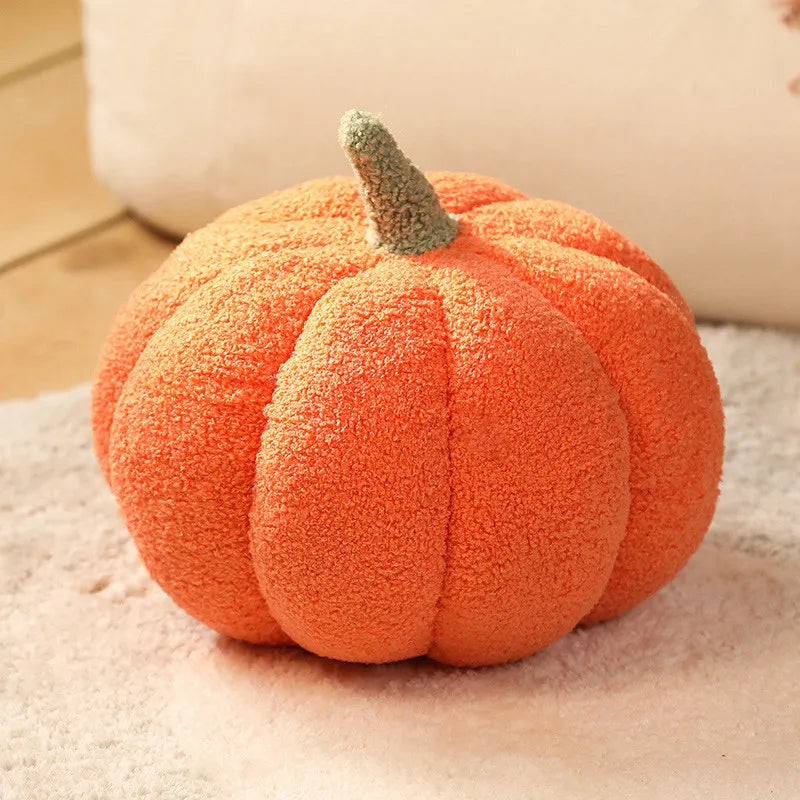 Fuzzy orange pumpkin on a soft surface