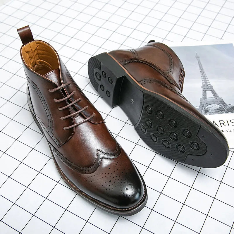 Brown leather shoes with black soles on a grid background