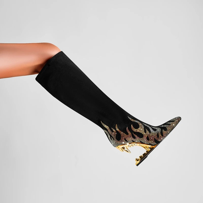 Black knee-high sock with gold and bronze flame design on a gray background