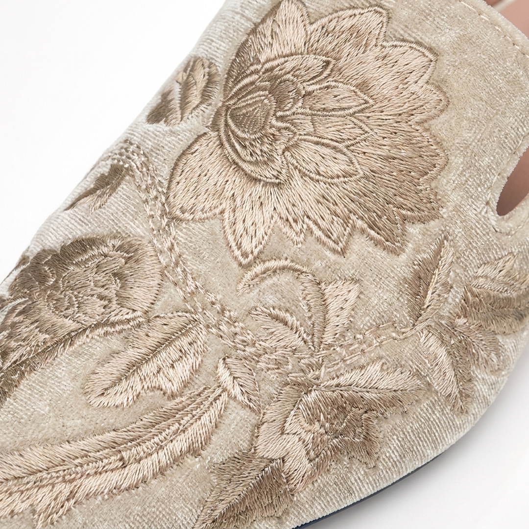 Beige Sabrina velvet mules, floral embroidery close-up