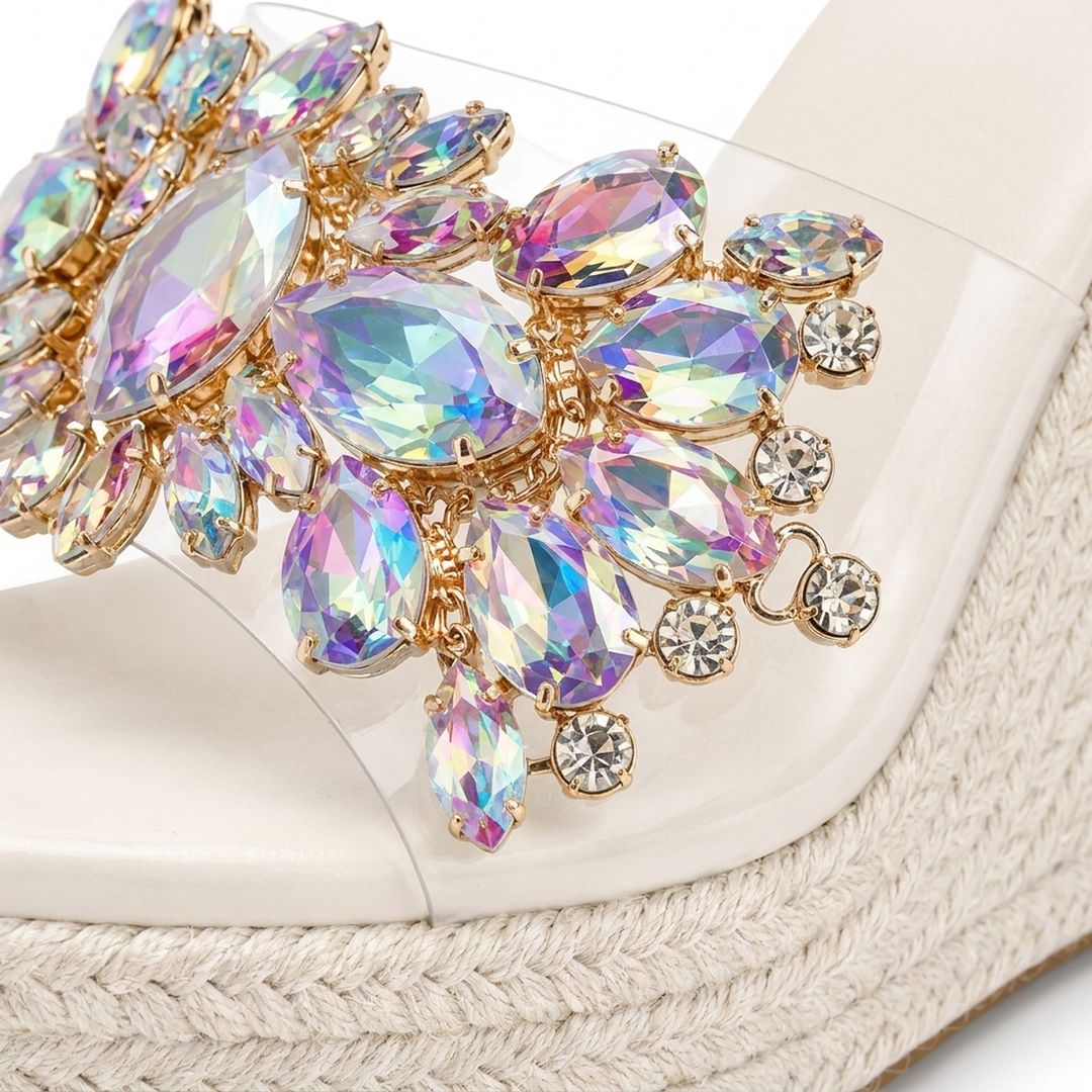 White Isabella crystal wedge heels, close-up of the iridescent crystal cluster and braided jute wedge