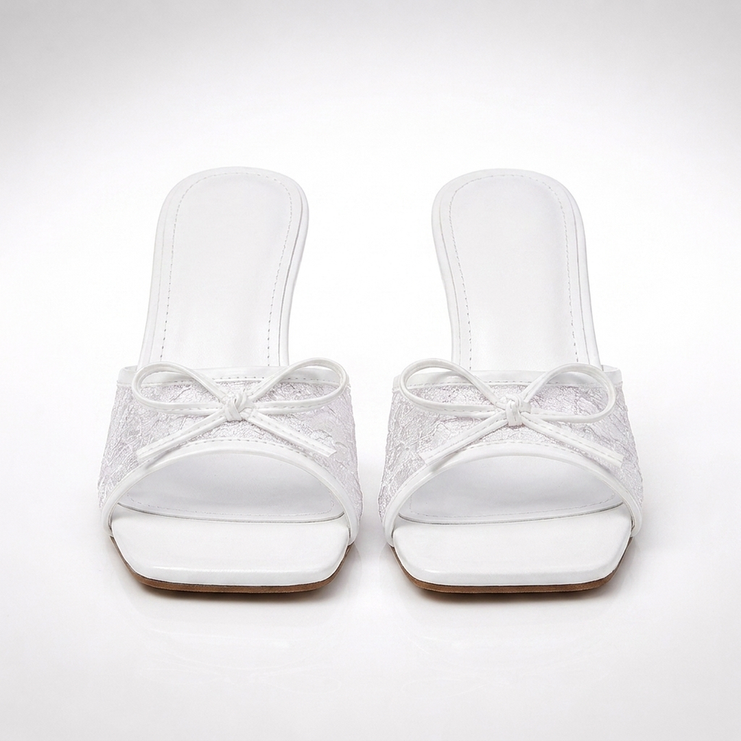 White Phoebe lace kitten heels, front view of the pair